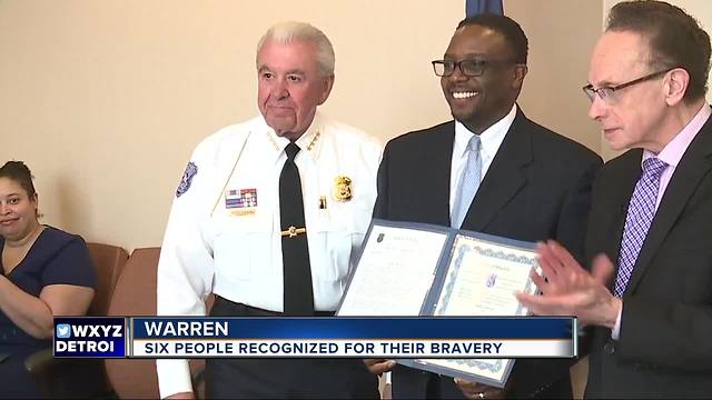 Warren honors citizens, including man who helped catch a suspected killer