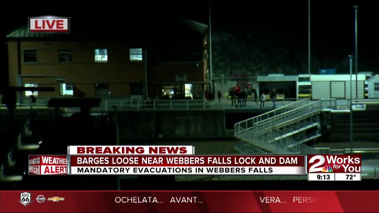 Barges loose from port, headed toward Webbers Falls Lock and Dam