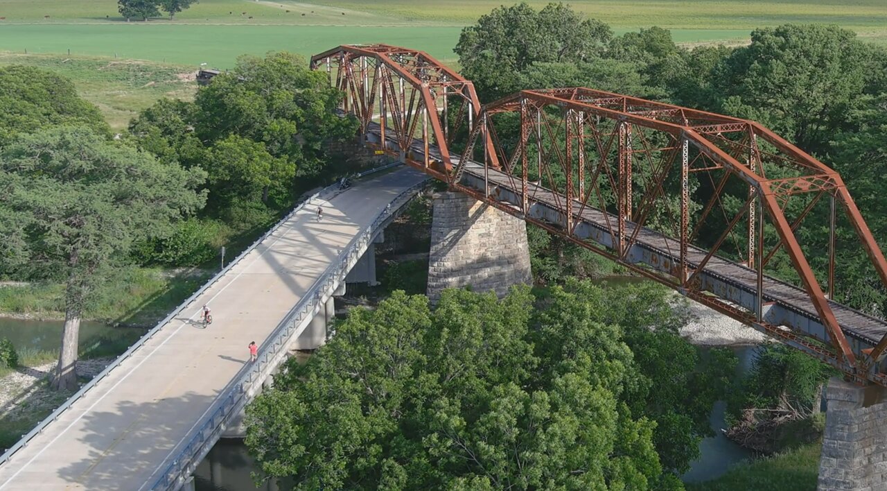 2021 Tour de Boerne - Drone View of Riders at Abandoned Iron Railroad Bridge & River Bend Park