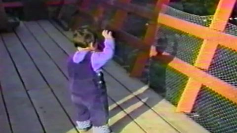 Kid Fascinated By Her Own Shadow