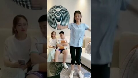 Chinese Girl Entertains at Home