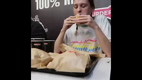 eating burger contest