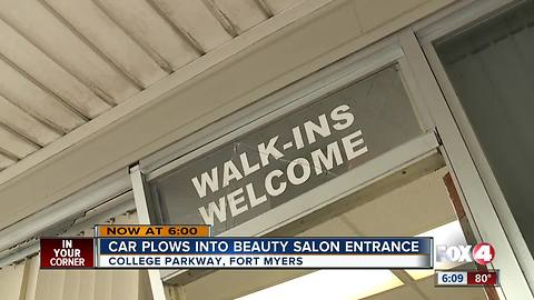 Car plows into salon