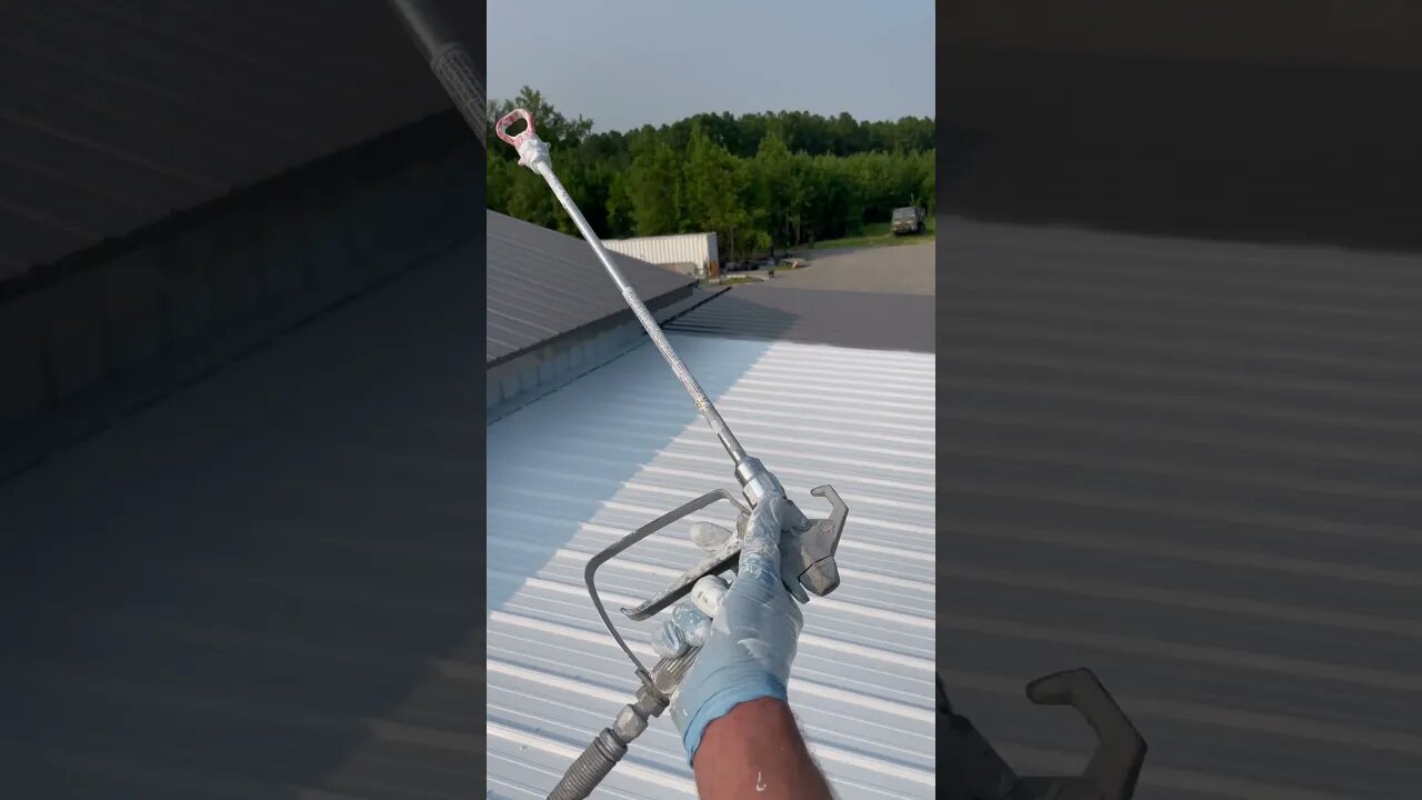 Spraying the roof white for the solyndra solar panels