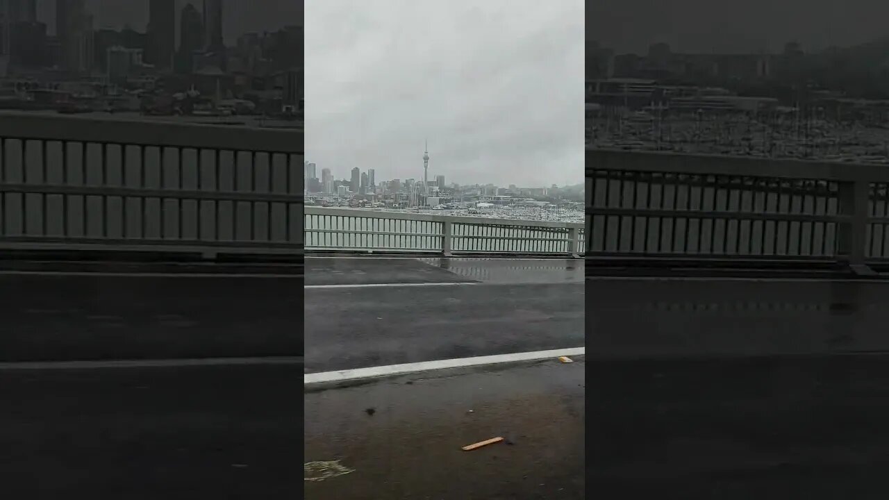 Across Auckland harbour bridge in terrible weather in summer.