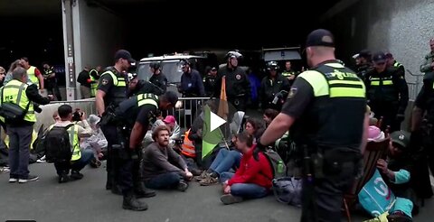 CLIMATE PROTESTERS BLOCK HIGHWAY IN NETHERLANDS Around 500 activists marched onto a highway...