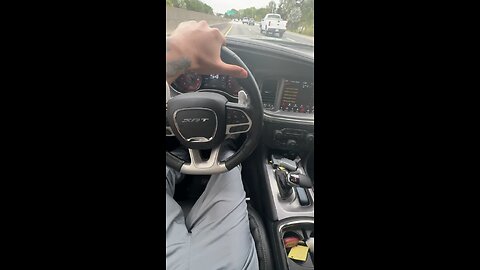 Sneako driving his hellcat