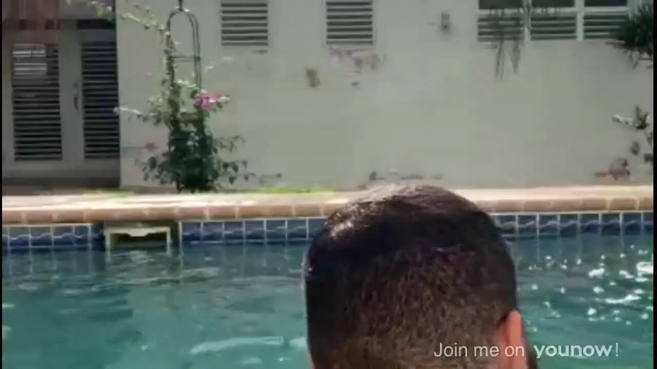Swimming by the pool