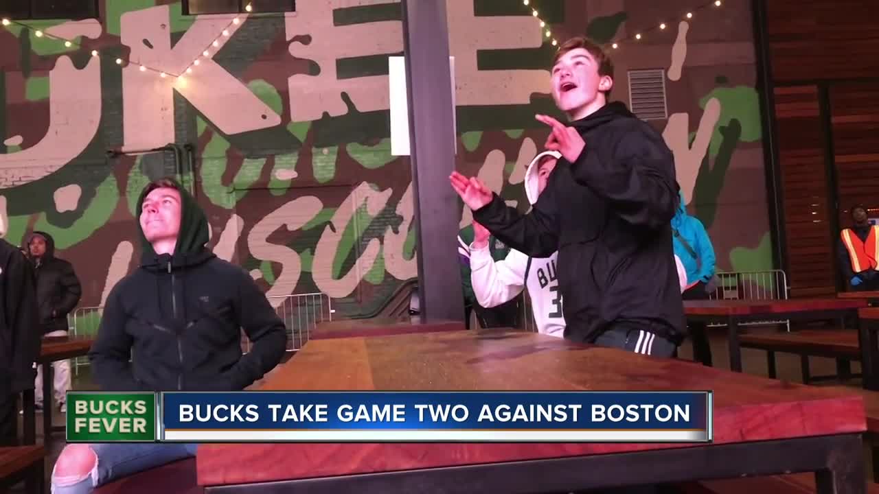 Rain, cold doesn't stop Bucks fans from watching Game 2