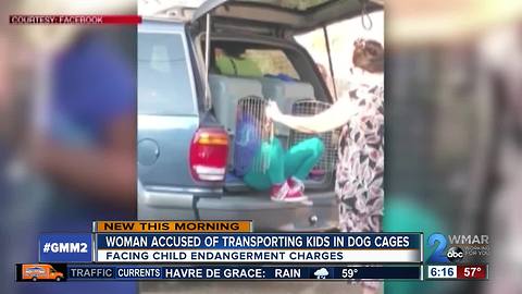 Woman accused of driving children in kennels to be arraigned