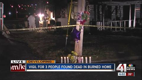 Vigil held for three people found dead in burned home