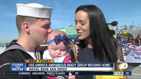 New dad reunited with wife, holds daughter for first time