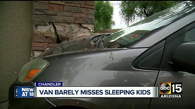 Pregnant woman crashes car into Chandler building