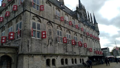 Dutch weekend market and cathedral in Gouda