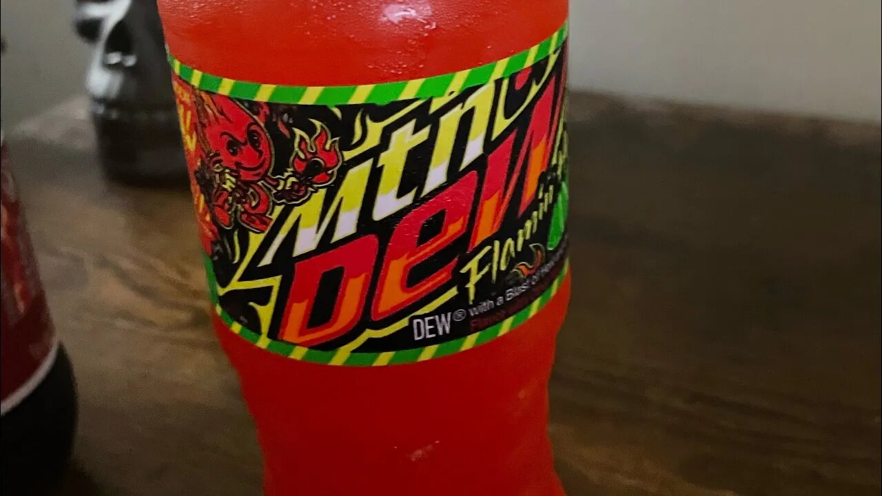 Food review~ I try the new flaming hot Mountain Dew.￼