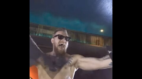 Conor McGregor RIPS poster of Jose Aldo