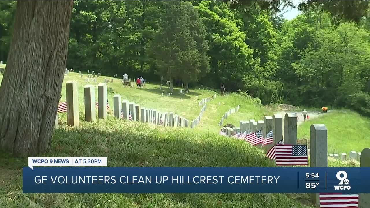 GE volunteers clean up cemetery