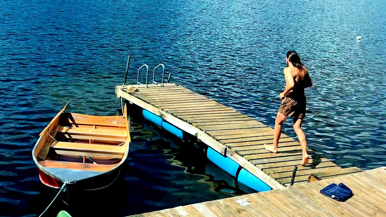 September slow motion running dive into lake