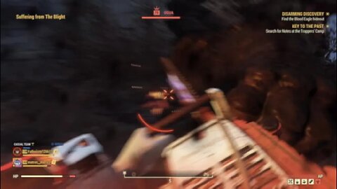 Fallout76 fight with a wild Ogua & a Scorchbeast