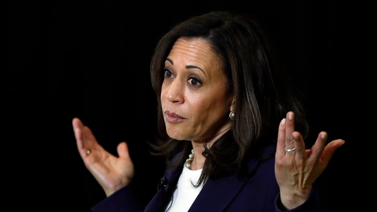 Kamala Harris laughs when reporter asks abut Americans stranded in Afghanistan.