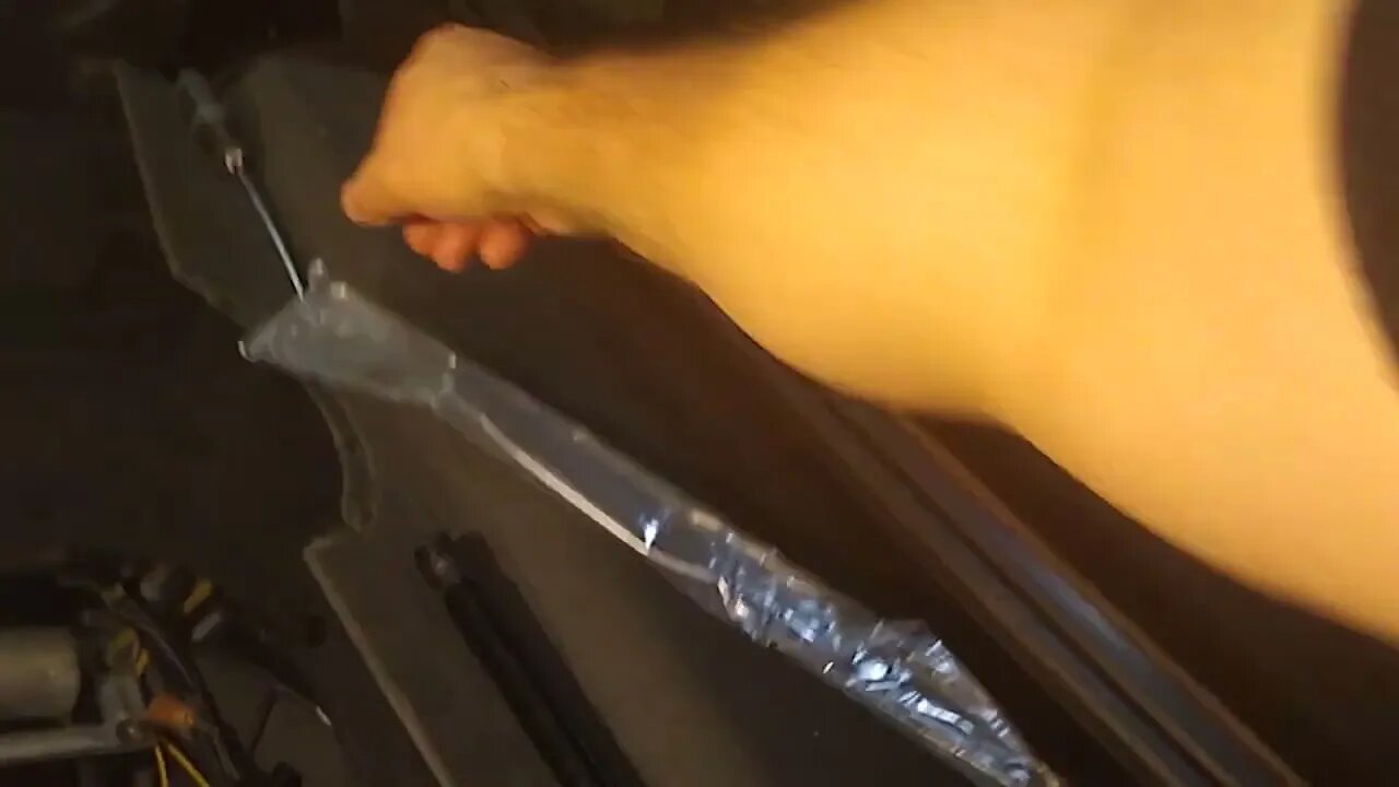 Replacing trunk lid struts on a Mercedes R230 SL500.-7