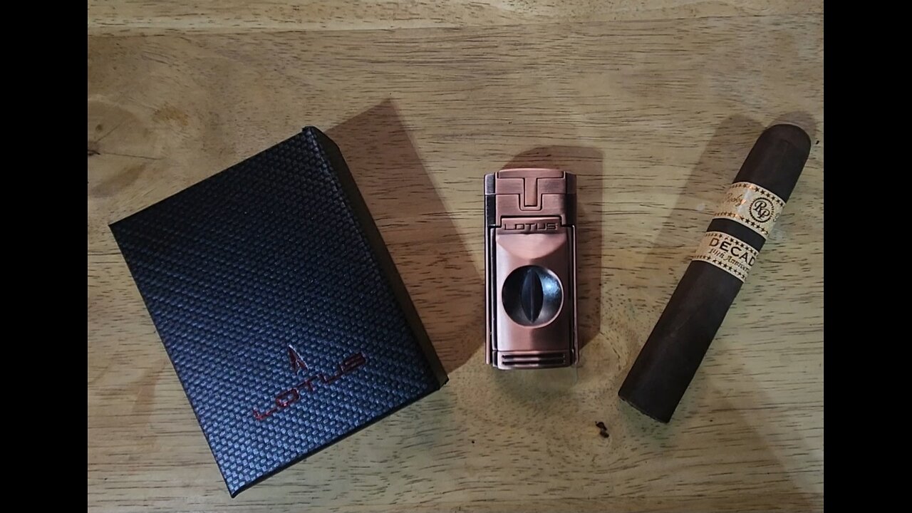 Rocky Patel Decade and my new Lotus Duke V-Cut torch.