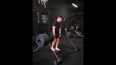 Banded Deficit B Stance Barbell Romanian Deadlifts