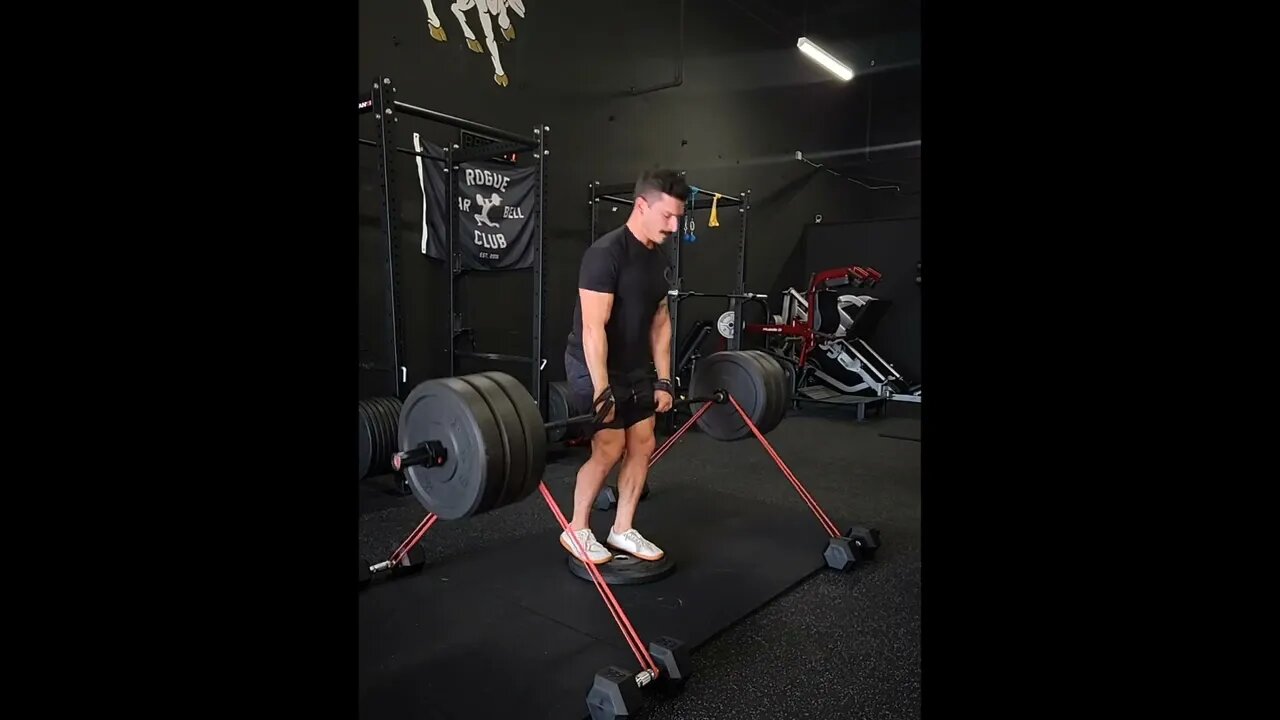 Banded Deficit B Stance Barbell Romanian Deadlifts