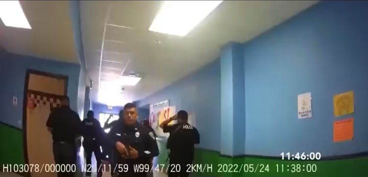 Body cam of Uvalde PD keeping Officer Ruiz away from his wife's classroom. Mireles bled out inside?