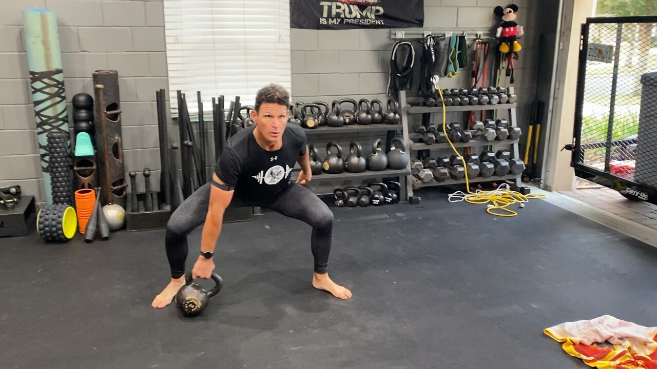 Kettlebell 180 degree squat drops