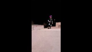 Little girl skateboarding in ATL park