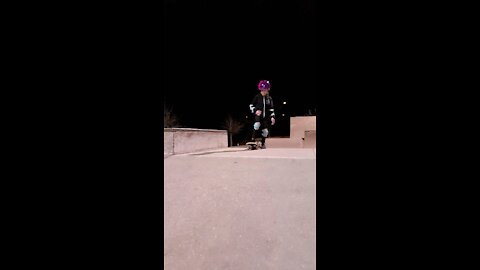 Little girl skateboarding in ATL park