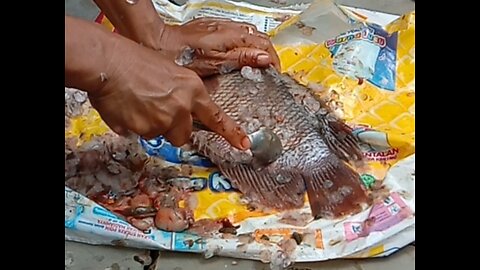 How to clean fish scales using spoon