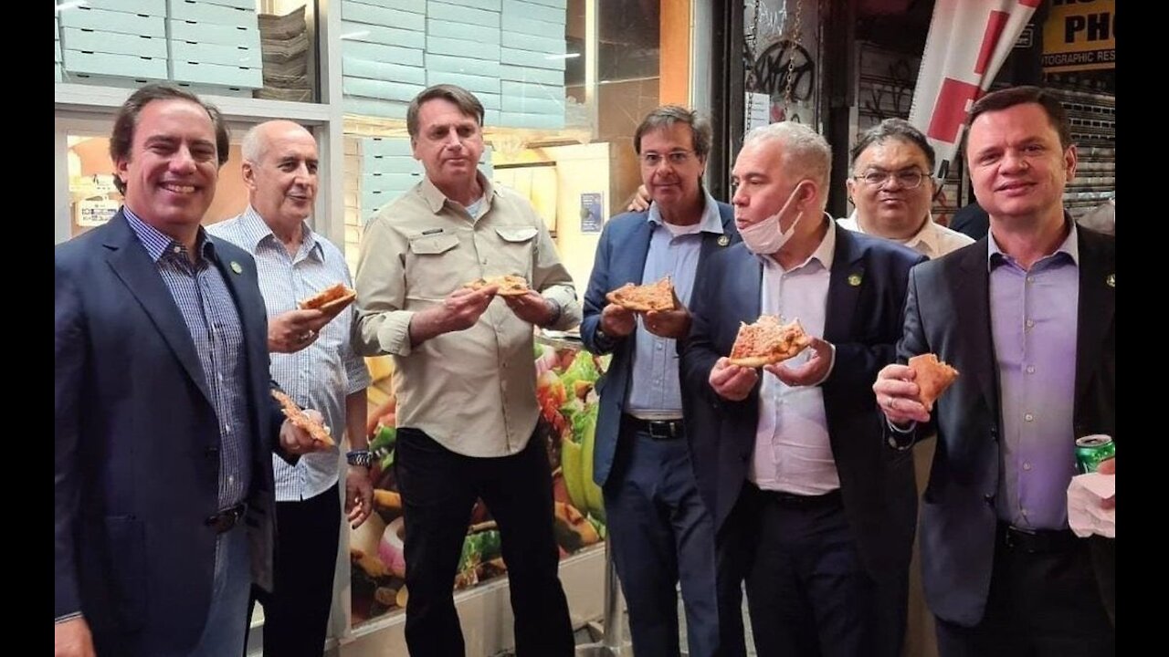 Unvaccinated Brazilian President Eats Pizza on NYC Sidewalk, Defends Pandemic Decisions