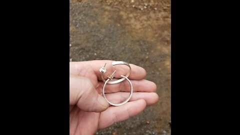 Silver earrings found metal detecting, minelab equinox 800, Washington State Park, marijuana pipe.