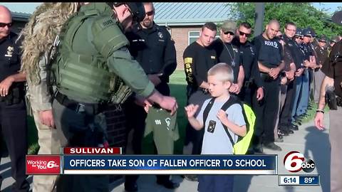 Officers escort son of fallen Terre Haute officer to school on his first day back after his father's death