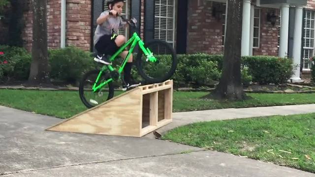 Kid Crashes Off Homemade Bike Ramp