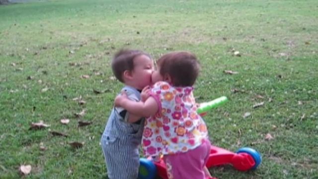 "Absolutely Adorable: Toddlers Kissing Intensely"