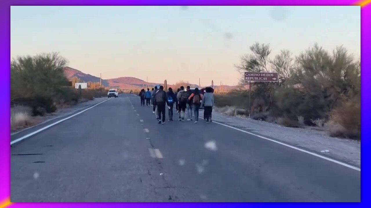 LUKEVILLE ARIZONA - MASSIVE NUMBER OF ILLEGALS WALKING IN MIDDLE OF HIGHWAY