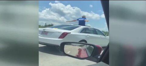 70-year-old driver stands up in car