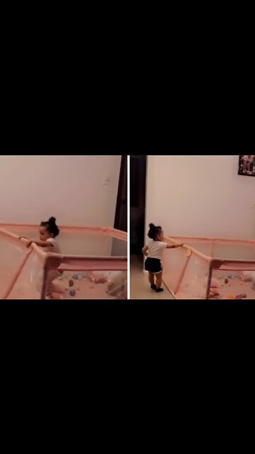 Determined baby discovers how to escape from play pen