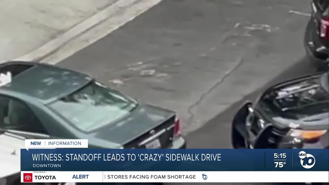 Downtown standoff leads to 'crazy' drive on sidewalk