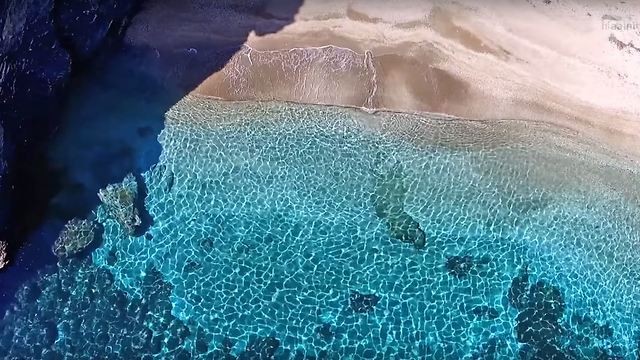 Drone reveals the secret lover's cove in Cavo D'Oro, Greece