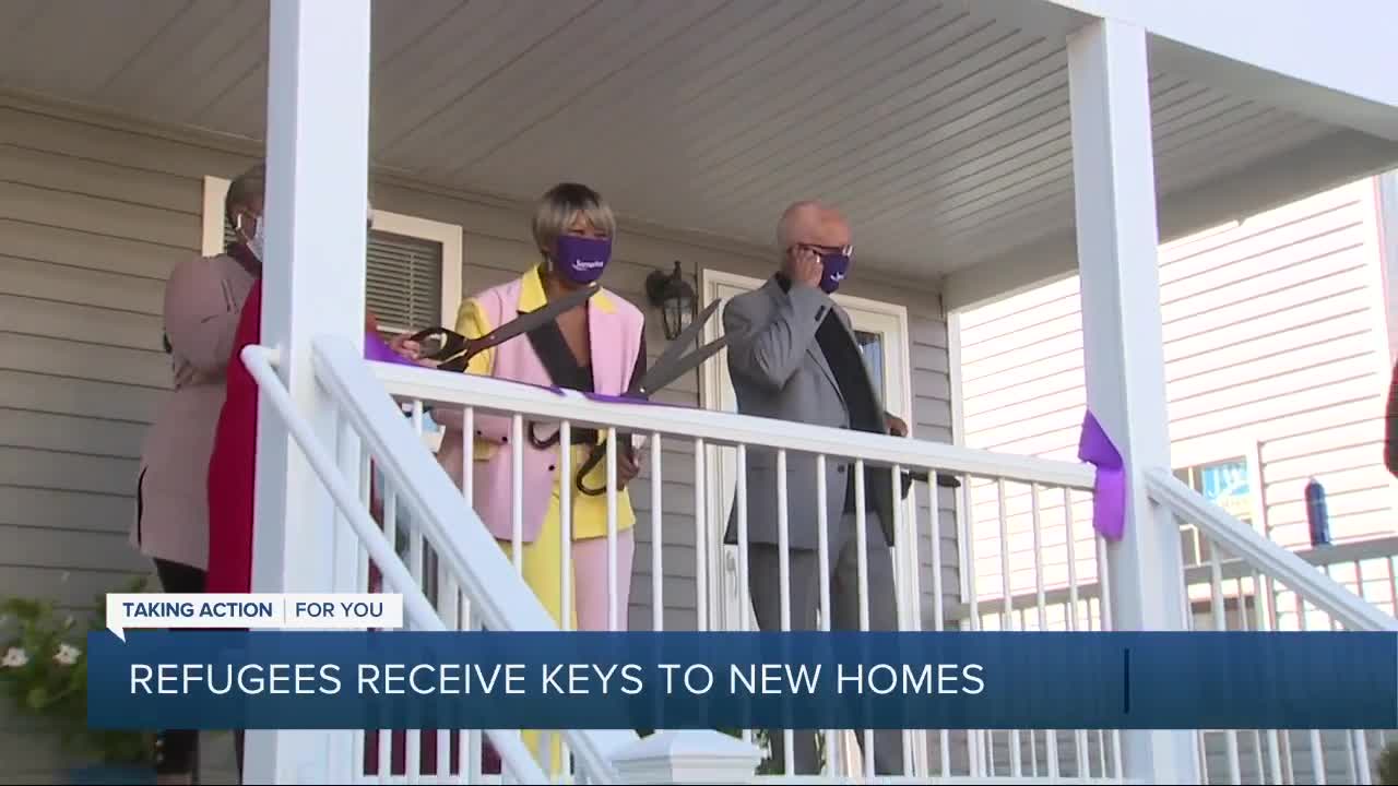 Refugees receive keys to new homes