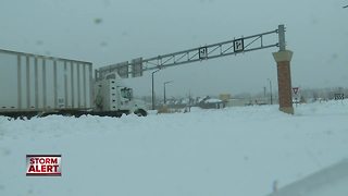 Crews work to clear roads in tough conditions