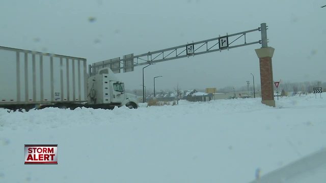 Crews work to clear roads in tough conditions