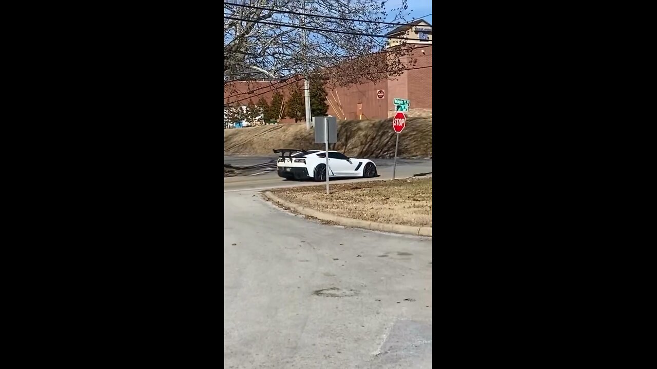 White Corvette makes noise in the neighborhood