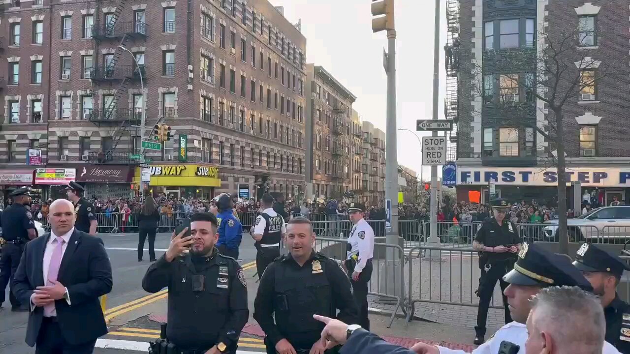 Crowd waiting to see Trump in Harlem.