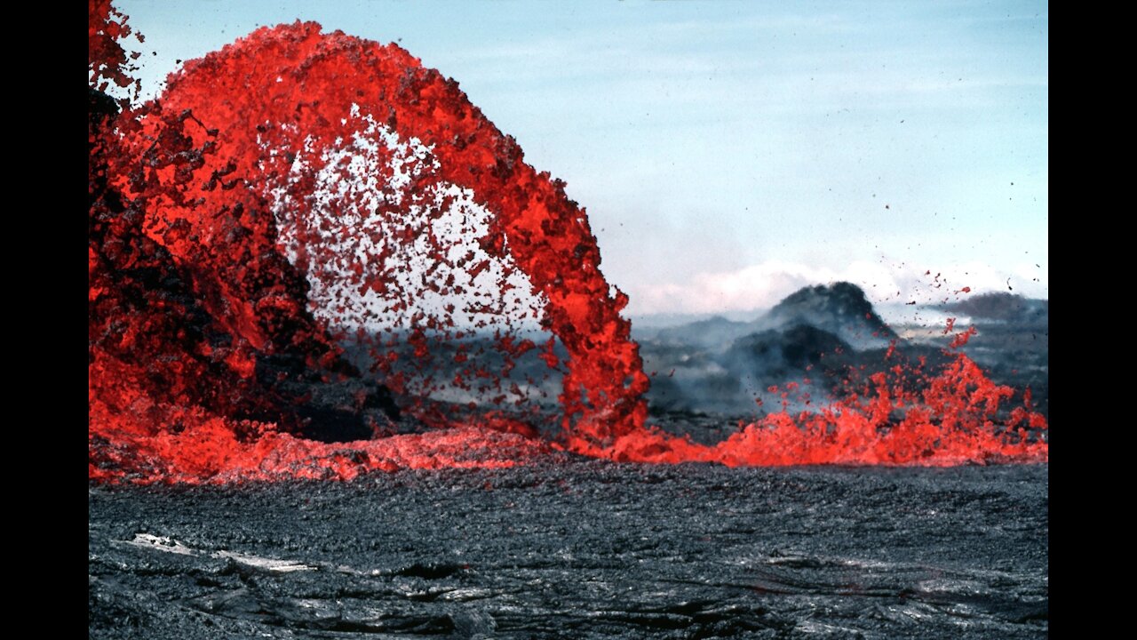 Larva erupting from the crater of a volcano 🌋