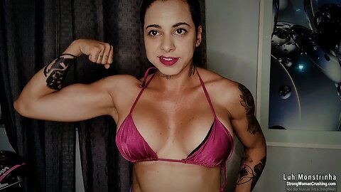 Watch Luh Monstrinha Flex Her Muscles and Smash a Headphone